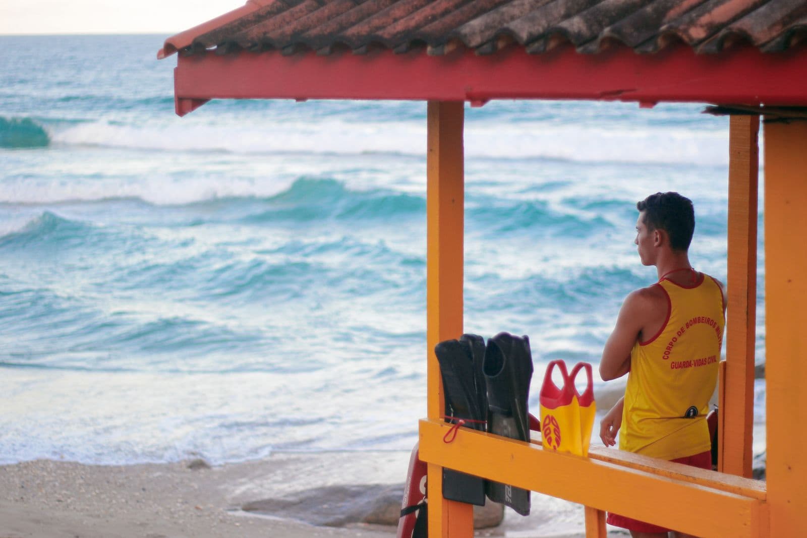 A lifeguard watching the ocean from a beach in Florianopolis
